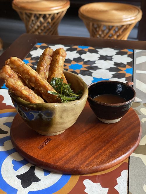 Tempeh sticks with lime leaves and BBQ sauce  at The Organik Kitchen Saigon in Ho Chi Minh City