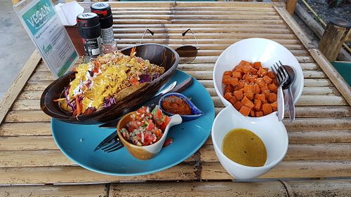 glurenfee vegan tacos(amazing and filling) + sweet potato cubes with a tasty yellow sauce. worth the money. at Pure Vegan Heaven in Koh Phangan