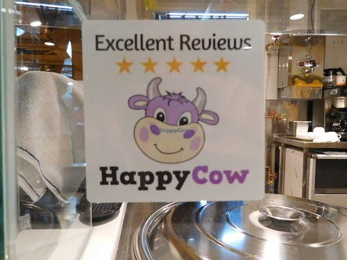 HappyCow sticker at Loving Hut 愛家 - KITEC in Kowloon