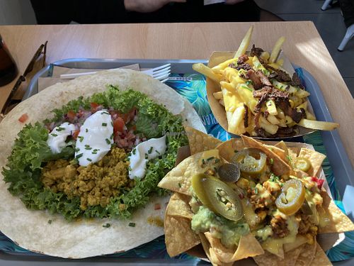 Shawarma wrap, loaded fries and nachos  at Khambú Quart in Valencia
