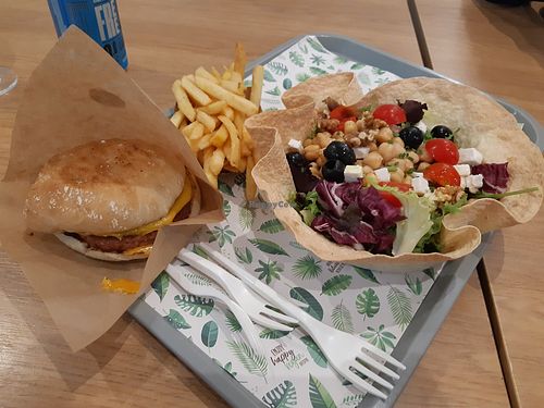 Burger, fries and Greek salad at Khambú Quart in Valencia