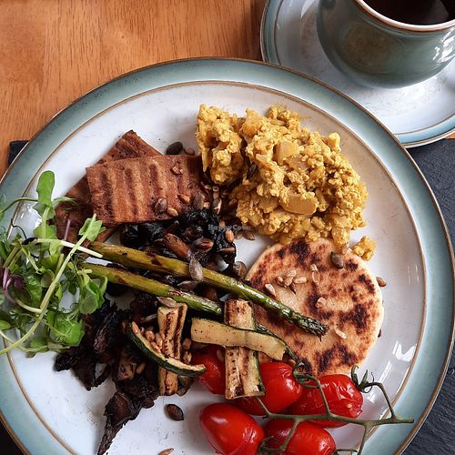 Some of the cooked breakfast options (tofu rashes, vegan scramble, potato cake, tomatoes, mushrooms) at Sandburne Vegetarian Guest House in Keswick