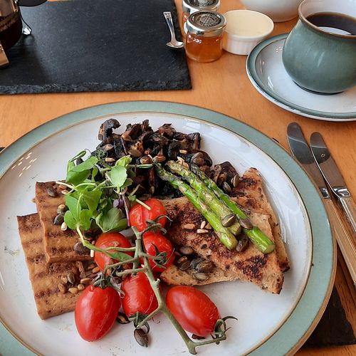 Some of the cooked breakfast options (tofu rashes, fried bread, tomatoes, mushrooms) at Sandburne Vegetarian Guest House in Keswick