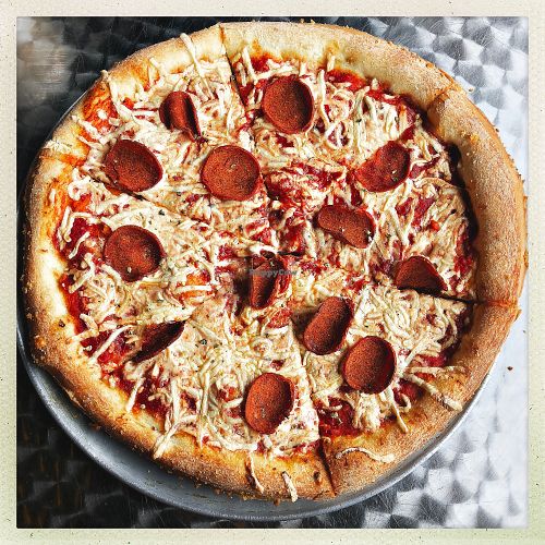 Vegan personal pizza, with vegan ‘pepperoni’.  at Little Nook Cafe in West Sayville