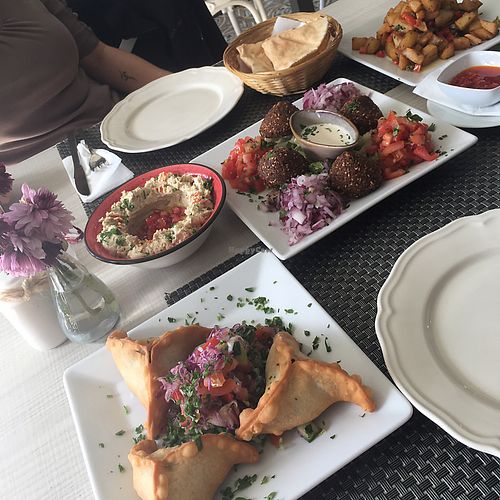 spinach empanadas, falafel and salads, babaganoush and the best potatoes ever  at Ilili in Tenerife