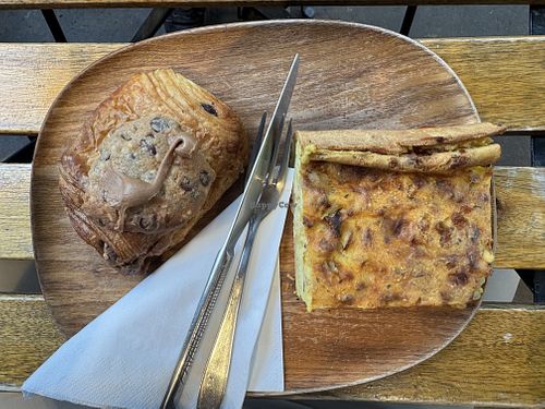 Crookolatine (croissant filled with and baked under chocolate chip cookie dough) and quiche  at VG Pâtisserie in Paris