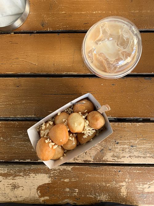 Lukumades with agave syrup & almond latte at Lukumades in Athens