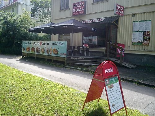 Outside the restaurant. There are nice seats outside the restaurant for sunny days. at Pizza Roma in Gothenburg