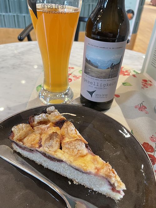 A slice of Streuselkuchen and a wheat beer at The Green.  at The Green in Nuremberg