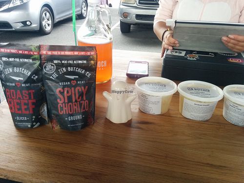 Sampling Zen's artisan meats and cheeses at Riverside Arts Market; creamy muenster, pepper jack and smoked gouda cheeses. Spicy chorizo and sliced roast beef. at The Zen Butcher Company in Jacksonville