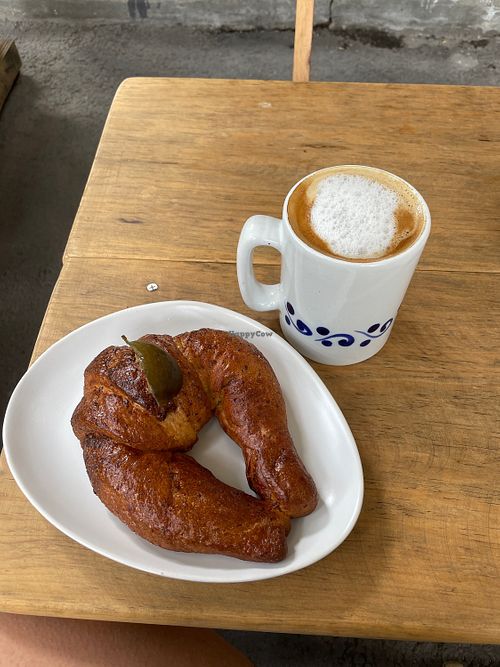 Capuccino with almond milk and pastry  at EnSalute Inntegral in Mexico City