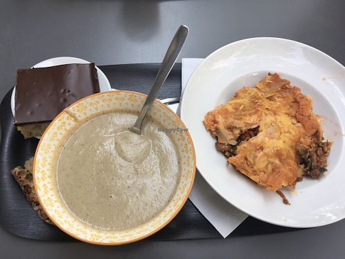From left to right : coconut cake with chocolate glaze, eggplant cold soup, lasagna  at Happy Feel in Lyon