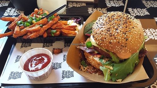 Burger with the sweet potato fries and ketchup. Yam at Vegan Junk Food Bar - 2D in Amsterdam