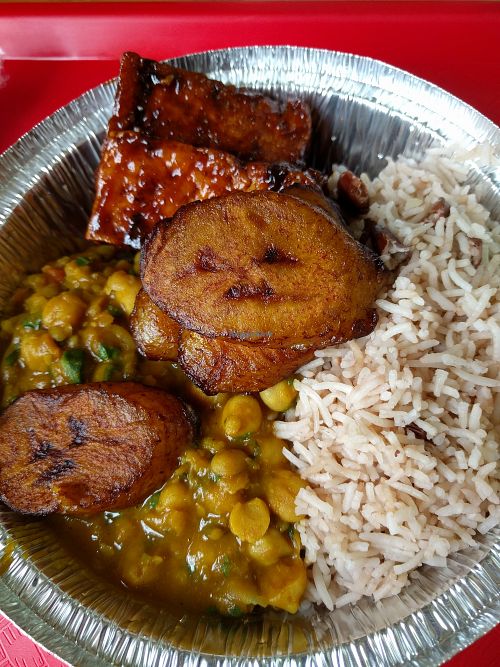 Jerk tofu, plantains, curried chickpeas and rice at Ninth Square Market Caribbean Style in New Haven