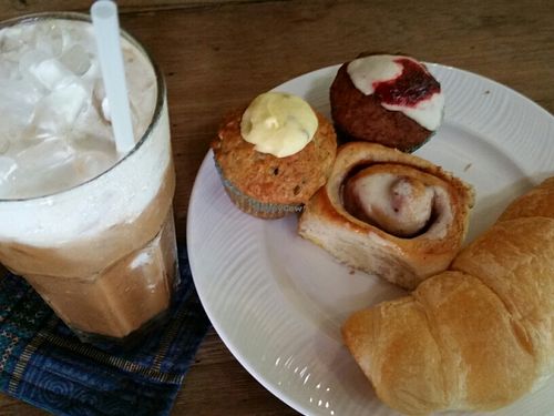 muffins, cinnamon roll, croissant and an iced cappuccino at Blue Diamond in Chiang Mai