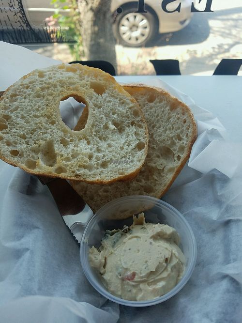 Bagel with a side of olive cream cheede at Morels Cafe in Louisville
