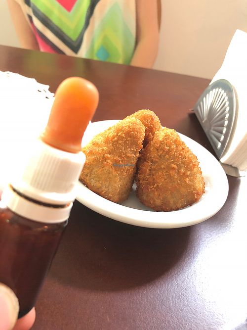 Jack fruit with hot pepper  at Estomago Cafe Vegano in Porto Alegre