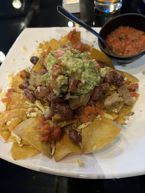 Nachos de la casa con salsa picante  at Fratello Vegan in Cuenca