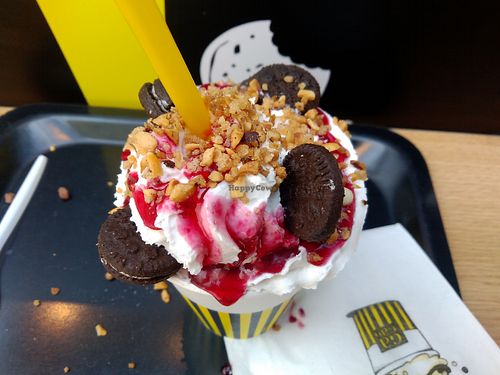 Vegan Hot Chocolate with soy whipped cream, mini oreo cookies, peanuts, raspberry topping...sweet treat!! at Gagao Cacaoteria in Serris