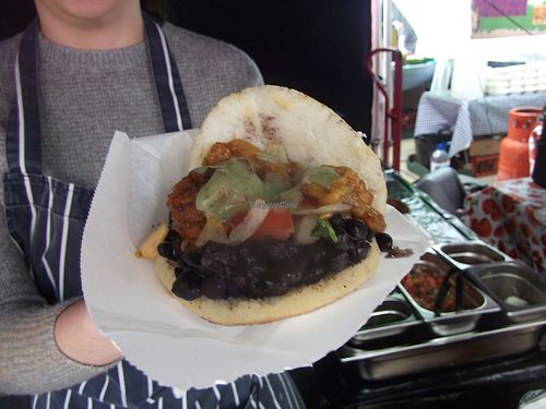 Venezuelan corn patties filled with plantain and beans.  at Lyric Square Market in West London
