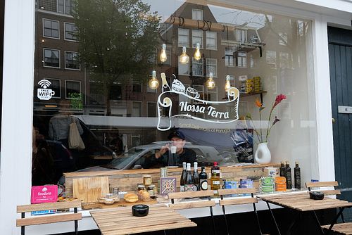 From outside looking into the cafe at Nossa Terra in Amsterdam
