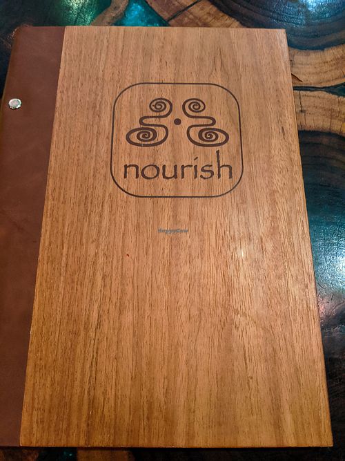 Front of menu for Atman Nourish Kafe (Dec-2019) at Atman Nourish Kafe in Ubud