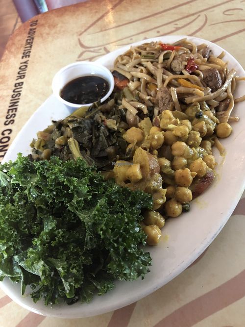 LoMein, collards, curry chick peas and kale salad at Universal Love Vegan Cafe  in Columbia