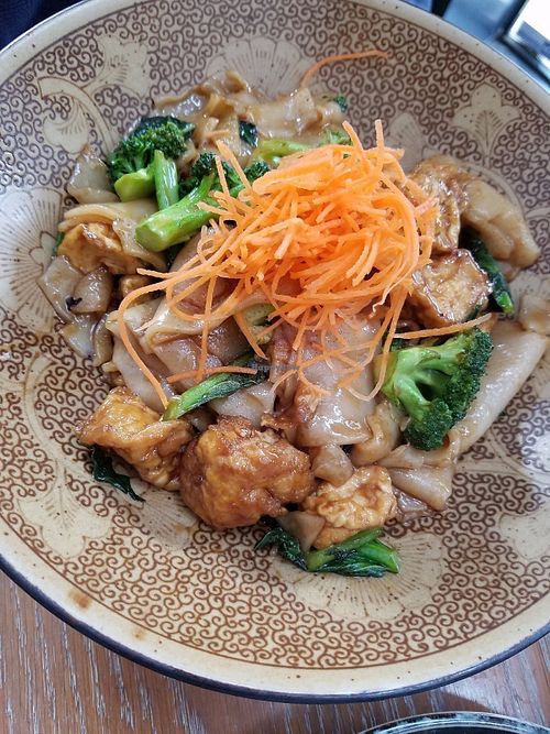 Vegan Pad See Ew with wide rice noodles, sauce, Chinese broccoli, American broccoli, fried tofu, and shredded carrot at DC Noodles in Washington