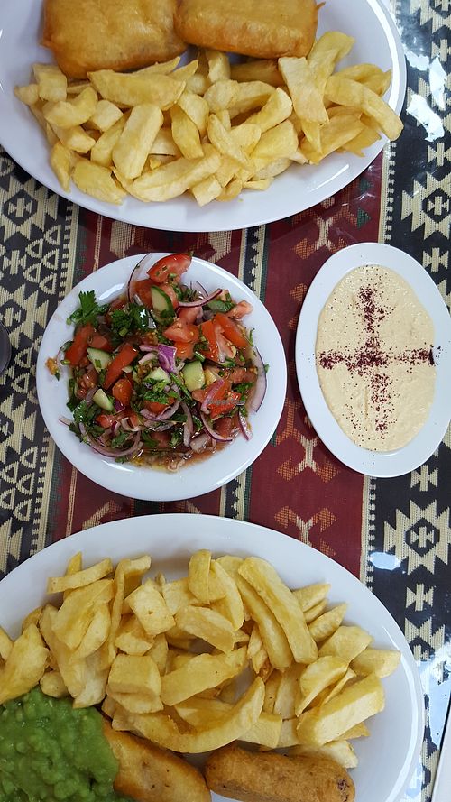 Tofish and chips plus battered sausage and chips with a side of mushy peas at Shakey Shakey in Ramsgate