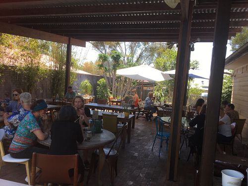 Outdoor seating at Garden Grub Cafe in Wingham