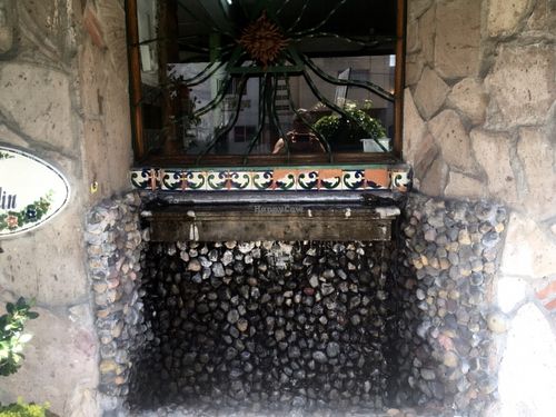 A little fountain out front - not a great iPhone picture on a bright day. at El Jardin Buffet Nutricional Vegetariano in Guadalajara