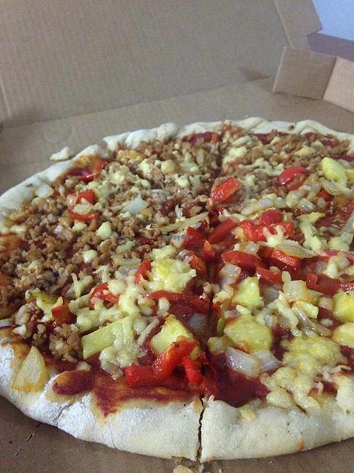 Pizza large, Supreme/Hawaiian. at Veggies Pizza in San Pedro