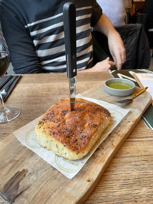 Sharing focaccia   at Woodstone in Haarlem