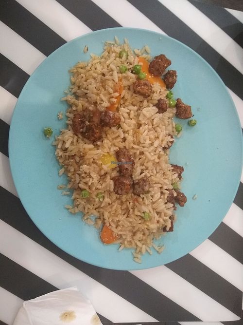 Brown rice with protein chunks and satay sauce at El Enano Verde in Torremolinos