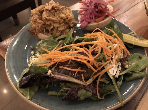 Side salad served with sandwich   at Surya Cafe in Fitchburg