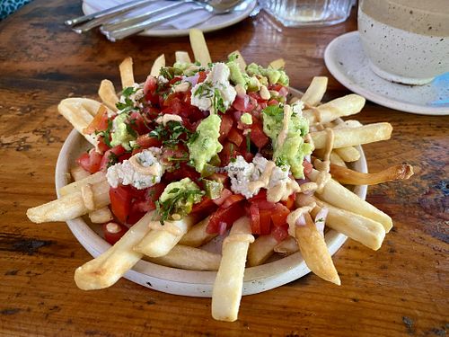 Nacho fries, loaded with beans under the salsa too. Be careful, it's a lot of food!  at Zest in Agonda
