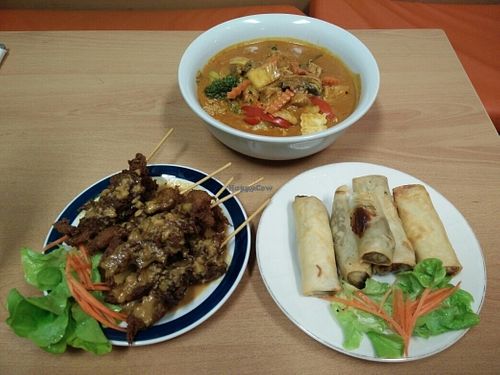 Satay sticks, spring rolls, and a very rich laksa at Peace Harmony - Erskine St in Sydney