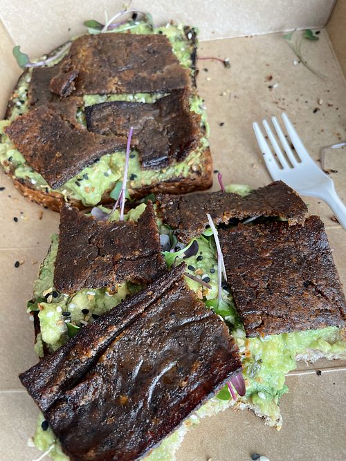 Avocado toast with the adzuki bacon!! Delicious.  at The Butcher's Daughter - West Village in New York City