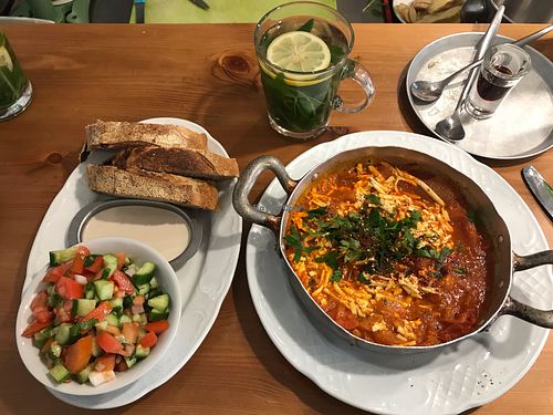 Vegan Shakshuka and tea of the house. at Michelangelo Cafe in Tel Aviv