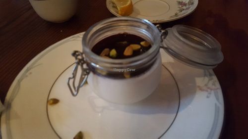 panacotta-like dessert with fruit toppings and pistachios at Aviv - Old Town in Portland