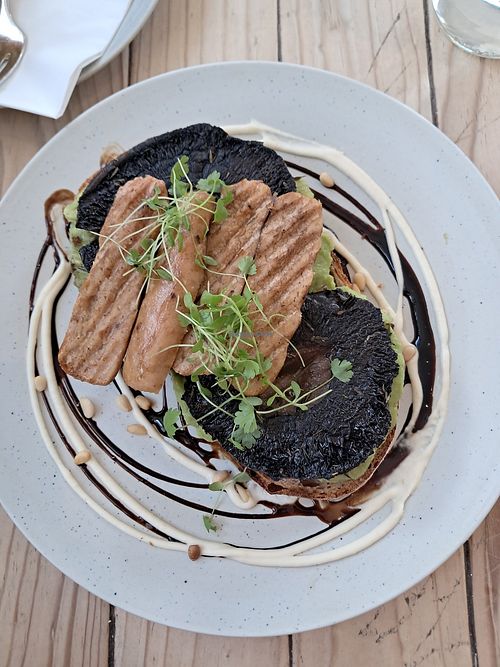 Avocado portobello toast with an extra sausage at The Beach House in Edinburgh
