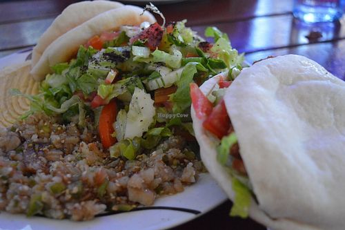 Vegetarian platter (Salad, Babaghanoush, Hummous) and falafel sandwich at Chez Joseph in Vientiane