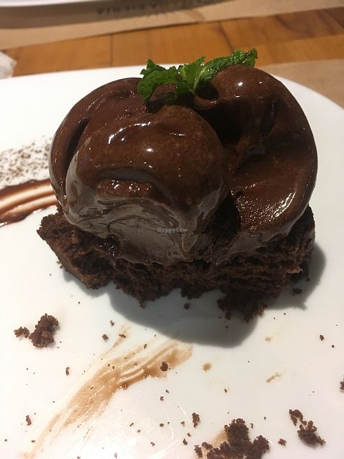 Chocolate cake with ice cream at Camaraderia Gastrobar in Belo Horizonte