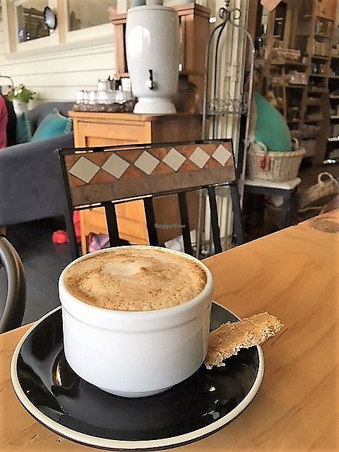vegan coffee with yummy nibble at Whole Life Organics in Maungaturoto
