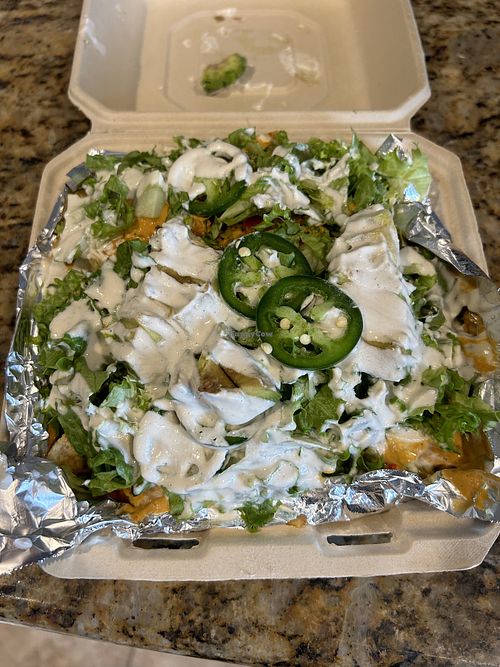 Nachos to go! So damn good! 🤤  at Zest Kitchen in Rocklin