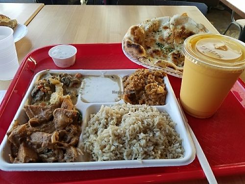 Smoked cauliflower,  Jackfruit, and mushroom curries. at Samosa House in El Segundo