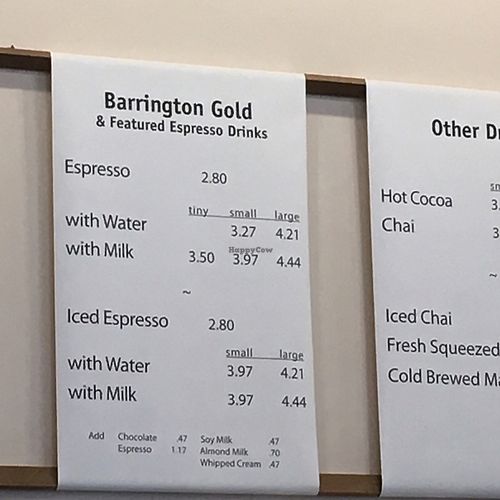 Soy milk and almond milk surcharges listed on menu. at Barrington Coffee Roasting Company in Boston