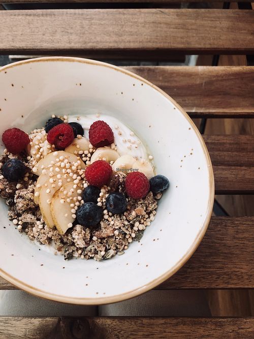 Fresh fruits, Coconut yogurt and pecan&quinoa granola bowl at Bunny's Deli in Madrid