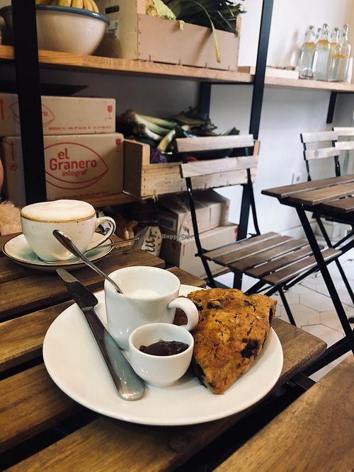 Scone with coconut yogurt and jam  at Bunny's Deli in Madrid