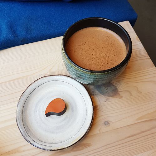 Vegan hot chocolate and peanut nougat praline at Ro Chokolade in Copenhagen